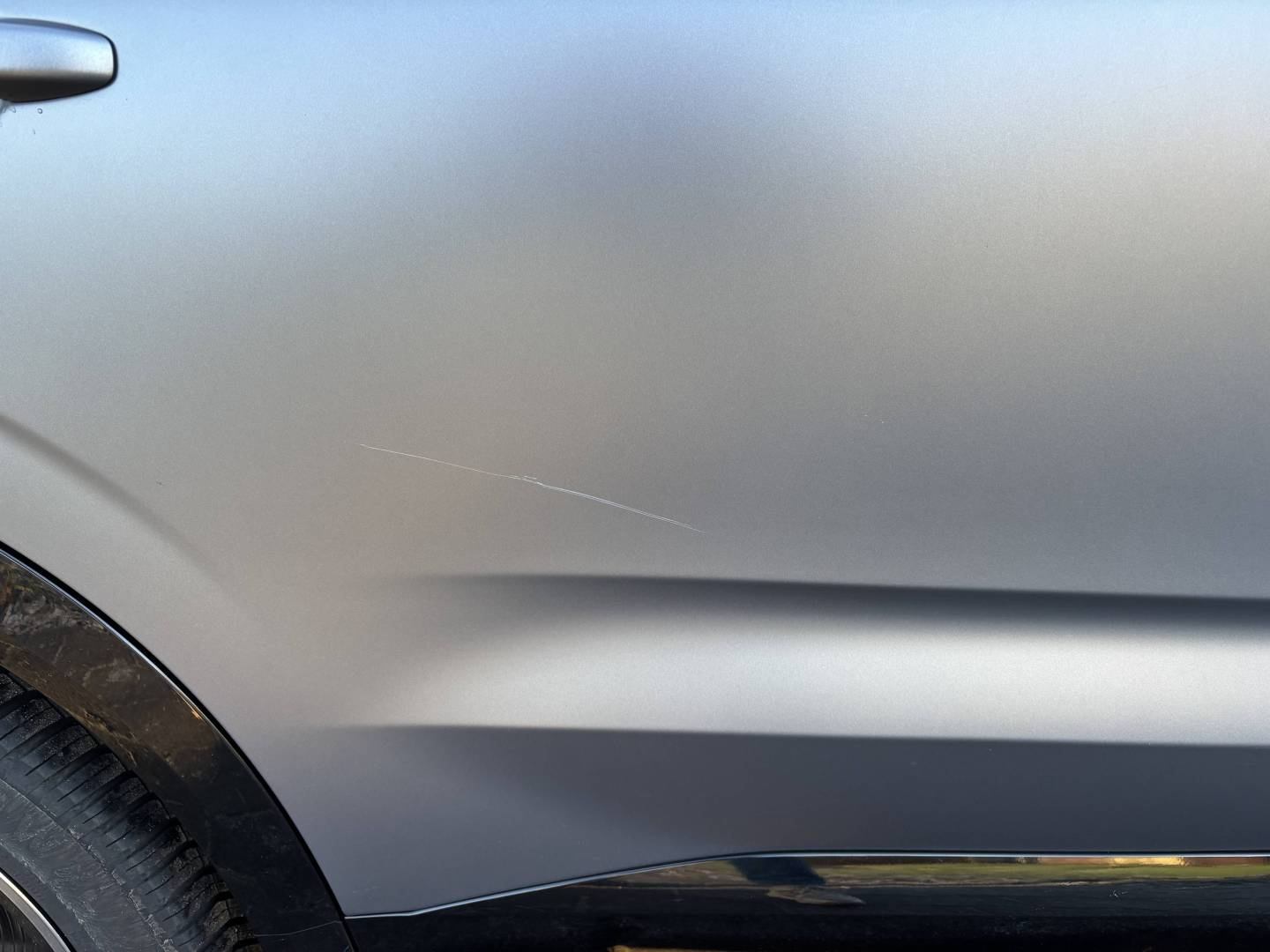 Kras rechter achterportier_0.jpeg